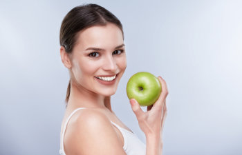 woman holding a green apple, Indian Land, SC