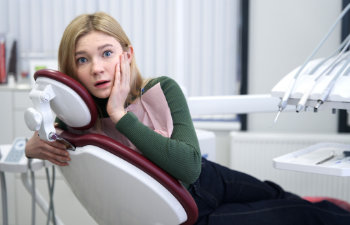 scared woman in dentist chair, Indian Land, SC